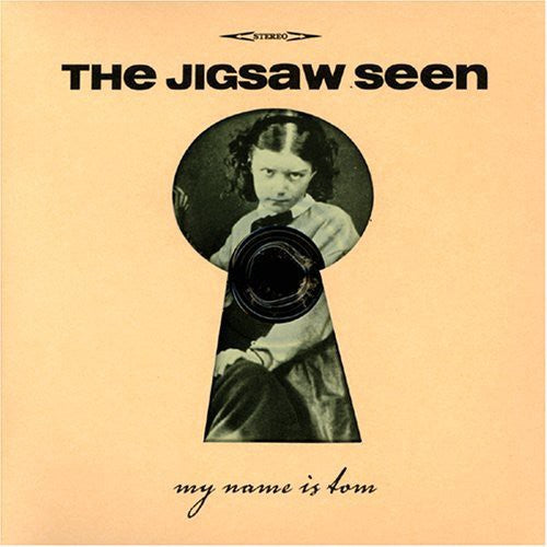 the album cover for Jigsaw Seen - My Name Is Tom