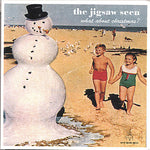 the album cover for Jigsaw Seen - What About Christmas