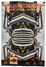 A vertical poster for 'The Alan Parsons Project - Ammonia Avenue' featuring a highly symmetrical, mirrored graphic of a futuristic machine or structure in black, white, and blue-gray tones, with orange title text at the top and small graphic elements along the bottom.
