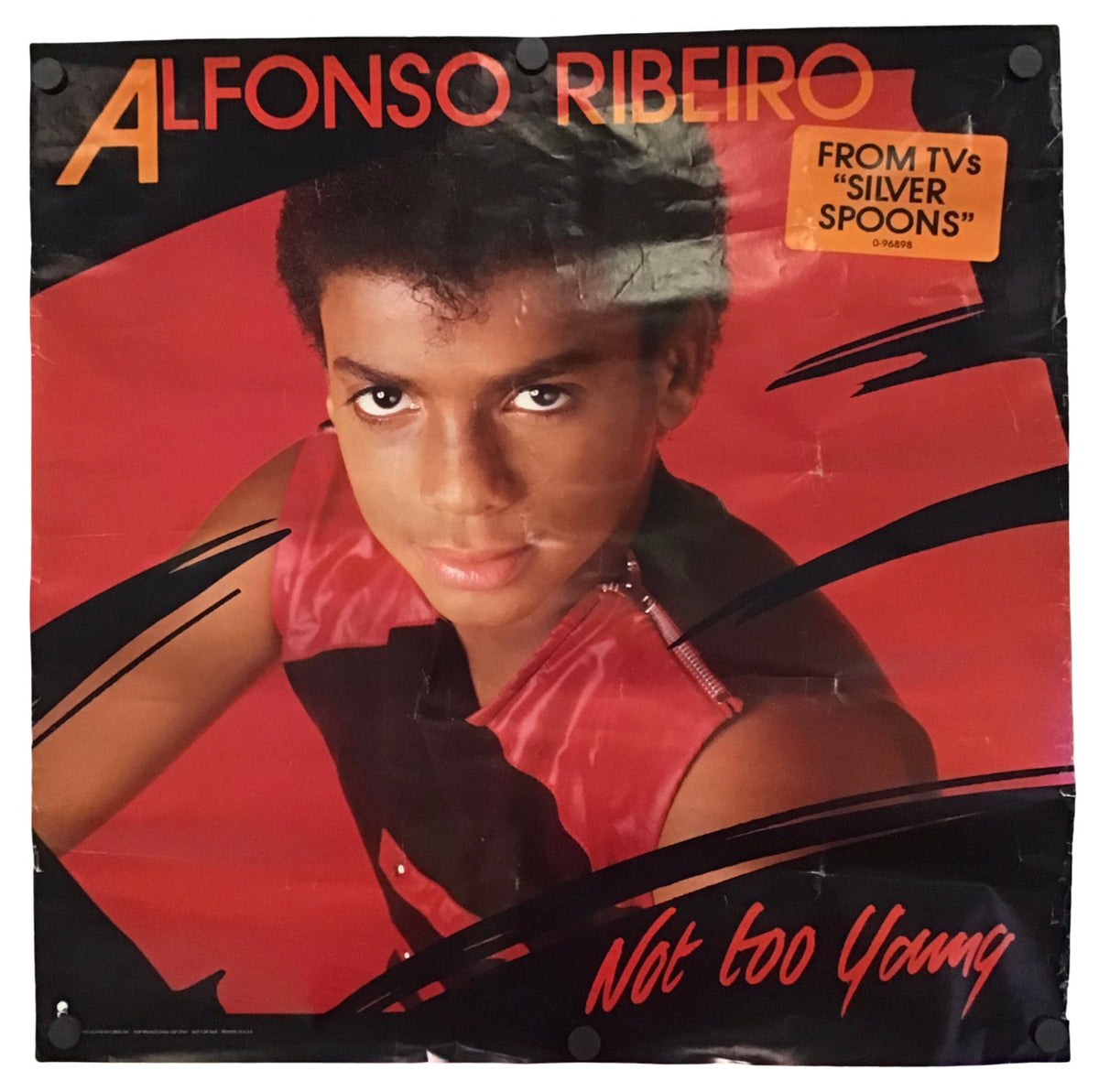 A vintage vinyl record sleeve for Alfonso Ribeiro's 'Not too Young' featuring a portrait of the artist against a red and black graphic background.