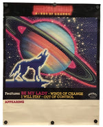 A vintage-style poster or print featuring a stylized wolf silhouette in front of a colorful ringed planet and starry space background. The top reads 'Jefferson Airplane' and the bottom includes song titles and text such as 'Be My Lady' and 'Winds of Change.