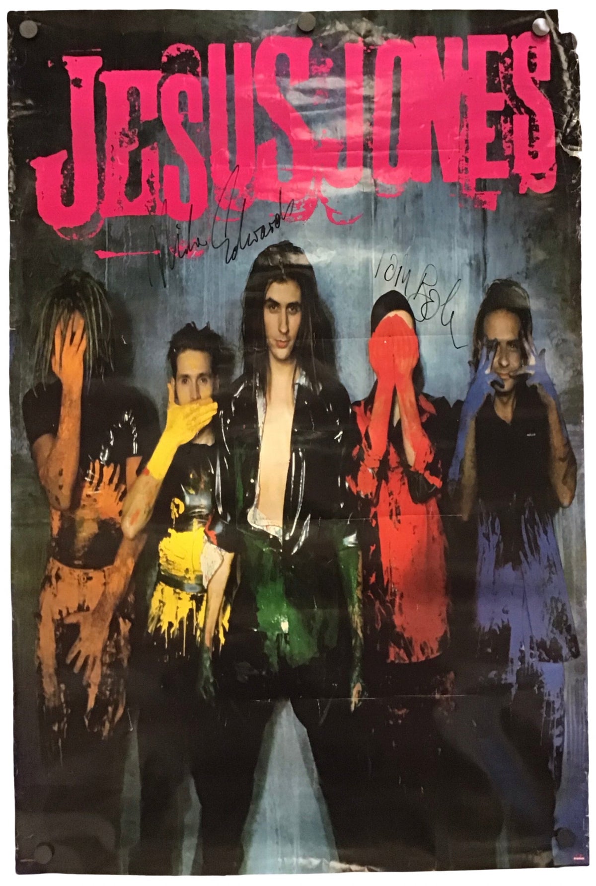 A signed vintage Jesus Jones band poster featuring the band members in a dark, grunge-style portrait with the band name 'JESUS JONES' in large pink letters at the top, shown against a plain white background.