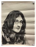 A black and white pencil-style portrait print of John Lennon, displayed on a beige sheet of paper with four binder clips at the corners against a white background.