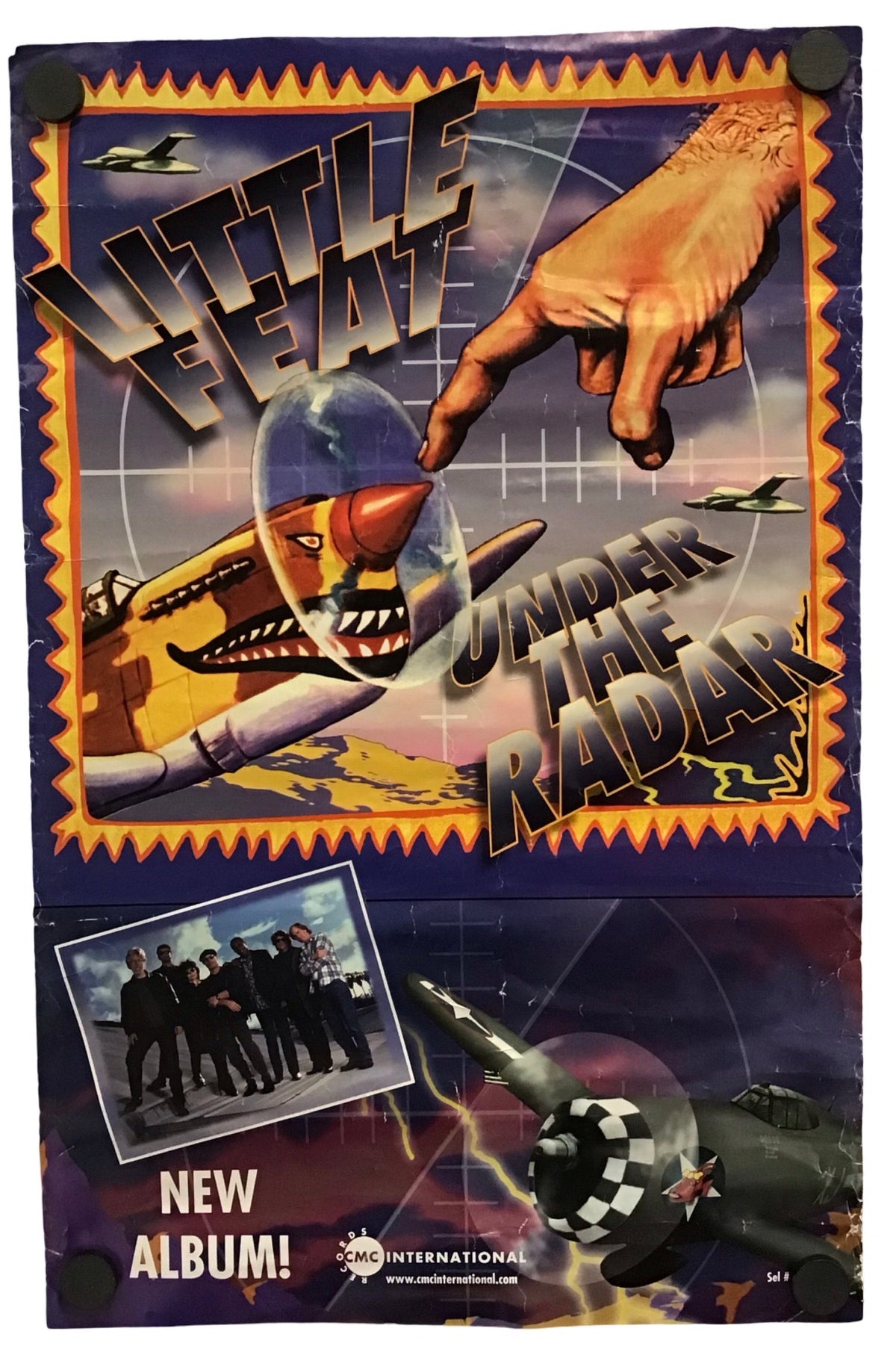 A vintage music poster for the band Little Feat album 'Under the Radar', featuring a colorful retro sci-fi illustration with a giant hand, fighter jets, and a small inset photo of the band members, displayed on a white background.