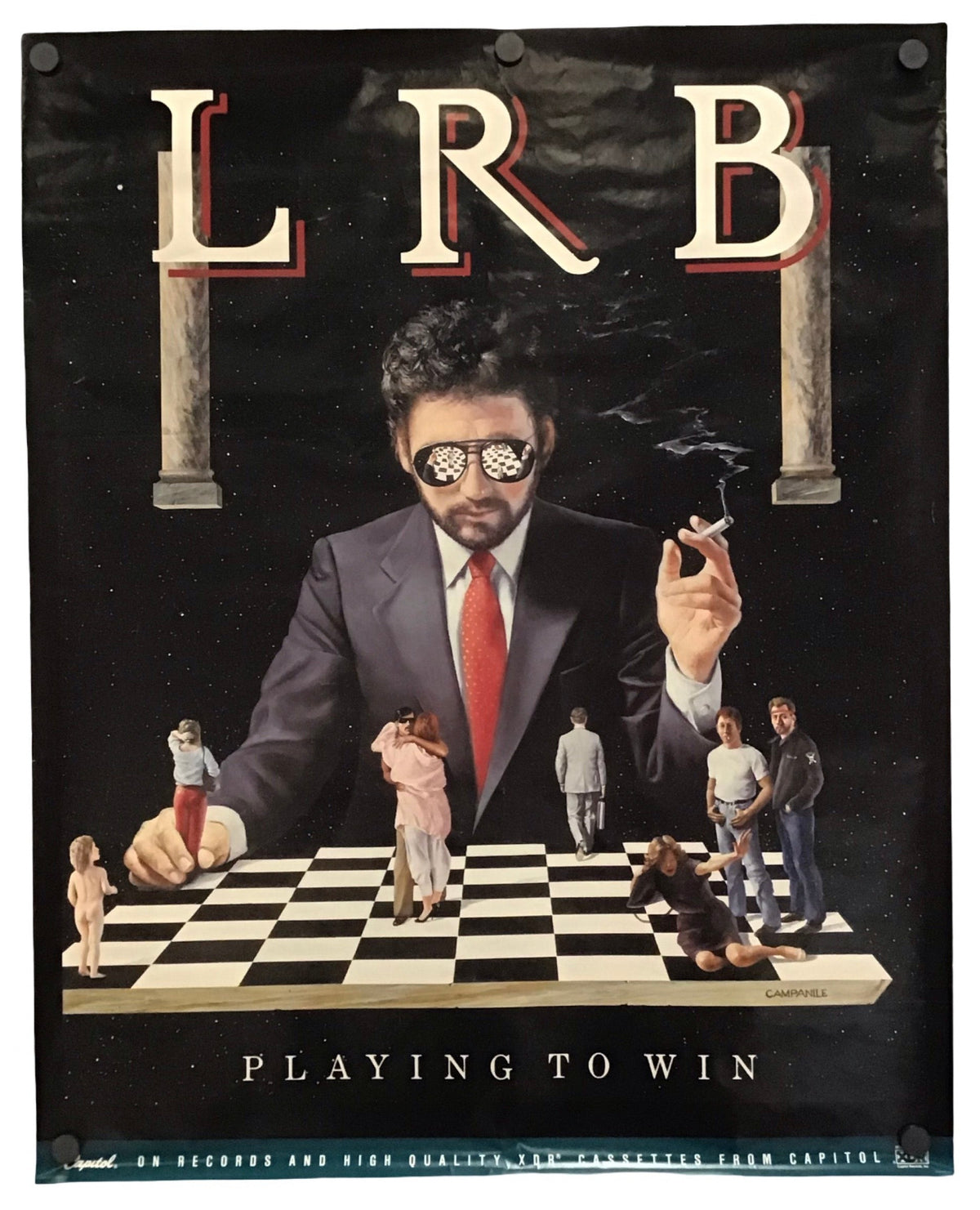 A vintage-style poster or print featuring the large letters 'LRB' at the top, a man in a dark suit and red tie at the center, and a chessboard with tiny human figures on it. The text 'PLAYING TO WIN' appears at the bottom.