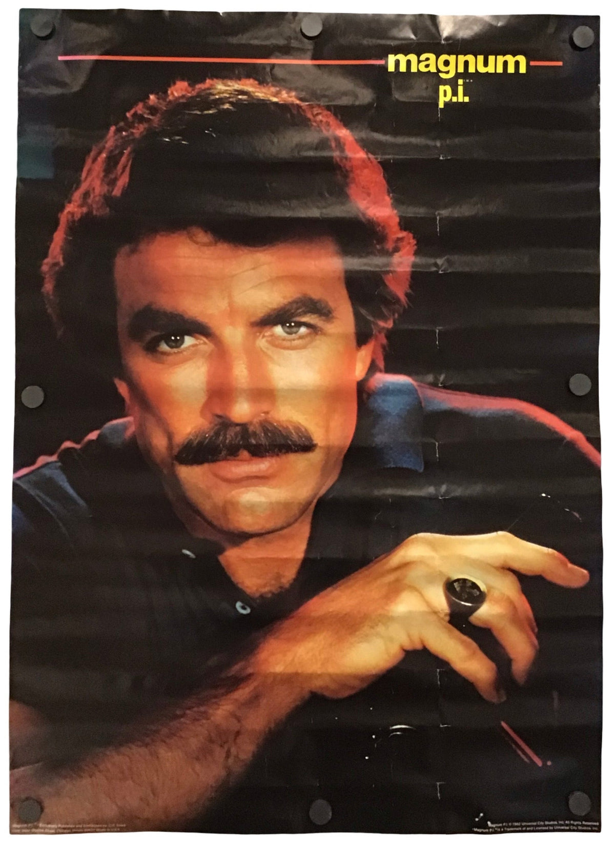 Vintage movie poster for the show 'Magnum Pi.' featuring a close-up portrait of the actor Tom Hanks with his signature mustache, set against a dark background with a yellow title at the top.