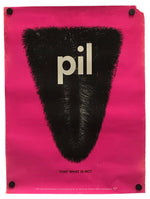 A poster print featuring a bright pink background with a large black fuzzy triangular shape in the center containing the word 'pil' in light beige. Small black pins are visible at the corners of the poster against a white background.