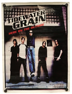 A vintage band poster for the rock group 'Tidewater Grain' from their album 'Here on the Outside', displayed on a white background with black corner fasteners.