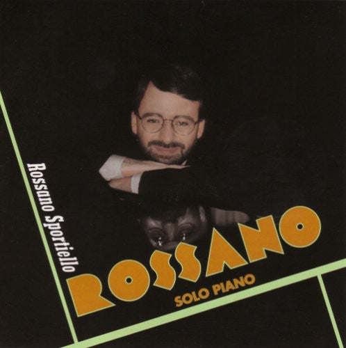 the album cover for Rossano Sportiello - In the Dark