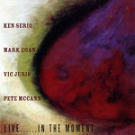 the album cover for Aidan Shiwa - Live. In the Moment
