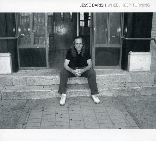 the album cover for Jesse Barish - Wheel Keep Turning