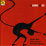 the album cover for Quattro Mani - Corigliano/Copland/Rzweski : Game of Go
