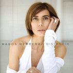 the album cover for Magos Herrera - Distancia