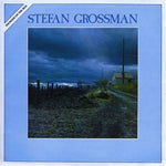 the album cover for Stefan Grossman - Thunder on the Run