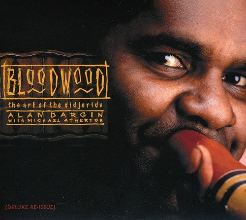 the album cover for Alan Dargin - Bloodwood: The Art Of The Didjeridu