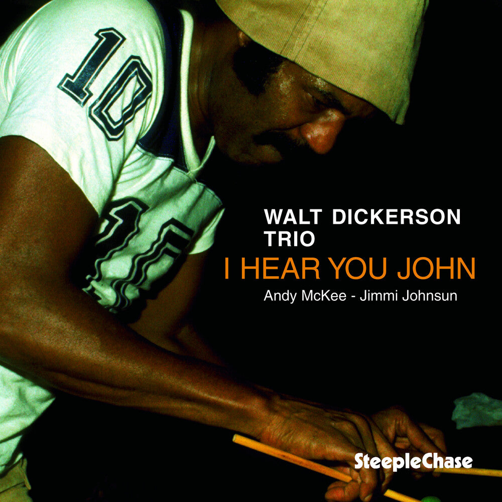 the album cover for Walt Dickerson - I Hear You John