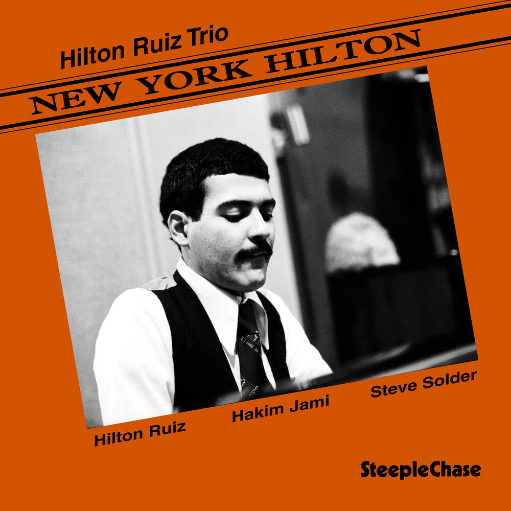 the album cover for Hilton Ruiz - New York Hilton
