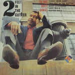 the album cover for Dave Bailey - Two Feet in the Gutter