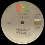 Focus (8) : Zero In July (12")