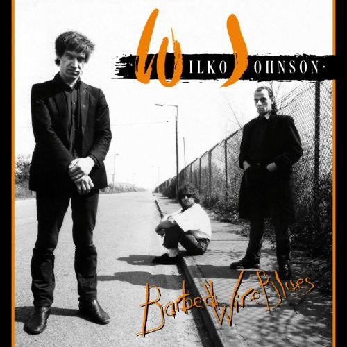 the album cover for Wilko Johnson - Barbed Wire Blues [Import]