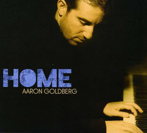 the album cover for Aaron Goldberg - Home