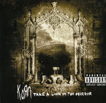the album cover for Korn - Take A Look In The Mirror [Import]
