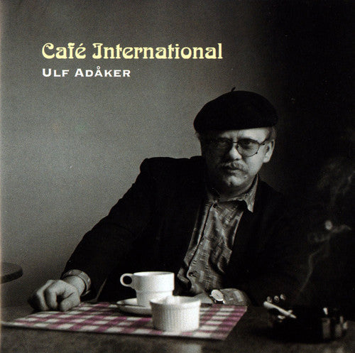 the album cover for Ulf AdÃ¥ker - Cafe International
