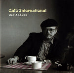 the album cover for Ulf AdÃ¥ker - Cafe International