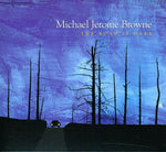 the album cover for Michael Browne Jerome - The Road Is Dark