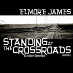 the album cover for Elmore James - Standing at the Crossroads
