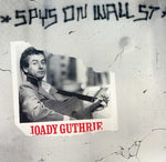the album cover for Joady Guthrie - Spys on Wall St