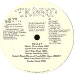 The Lovers (5) : Discomania (Medley) (12", Promo)
