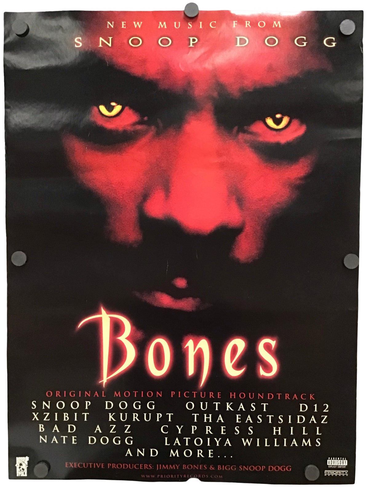 A Bones motion picture poster featuring a dark red and black face with glowing red eyes and the title 'Bones' in large red lettering, with Snoop Dogg and other cast names printed below.