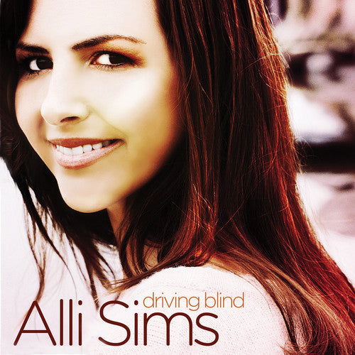 the album cover for Alli Sims - Driving Blind