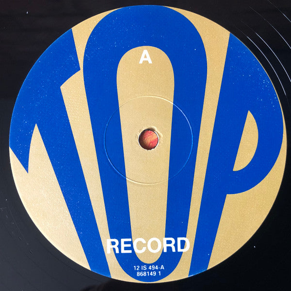 Top : She's Got All The World (12")