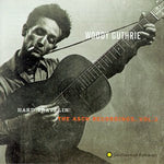 the album cover for Woody Guthrie - Hard Travelin: Asch Recordings 3