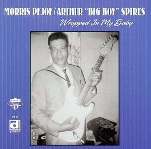 the album cover for Pejoe/Spires - Wrapped in My Baby