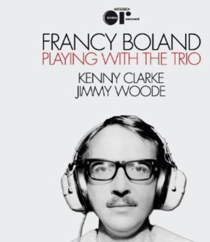 the album cover for Francy Boland - Playing with the Trio