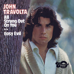 the album cover for John Travolta - All Strung Out on You / Easy Evil