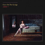 the album cover for Jamie T - Carry on the Grudge