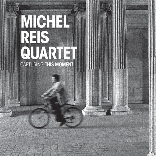the album cover for Michael Reis - Capturing This Moment