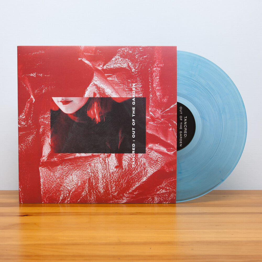 the album cover for Tancred - Out Of The Garden [180 Gram] [Download Included]