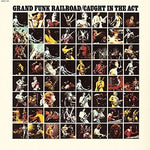 the album cover for Grand Funk Railroad - Caught in the Act