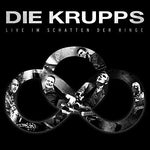 the album cover for Die Krupps - Live Im Schatten Der Ringe
