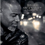 the album cover for Brian Mcknight - An Evening With