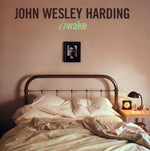 the album cover for John Wesley Harding - Awake