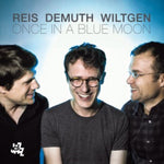 the album cover for Reis Demuth Wiltgen - Once In A Blue Moon