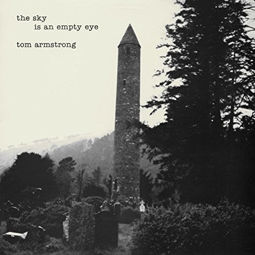the album cover for Tom Armstrong - The Sky Is An Empty Eye