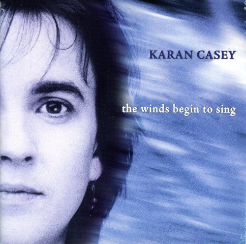 the album cover for Karan Casey - The Winds Beging To Sing