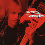 the album cover for Tom Petty & The Heartbreakers - Long After Dark